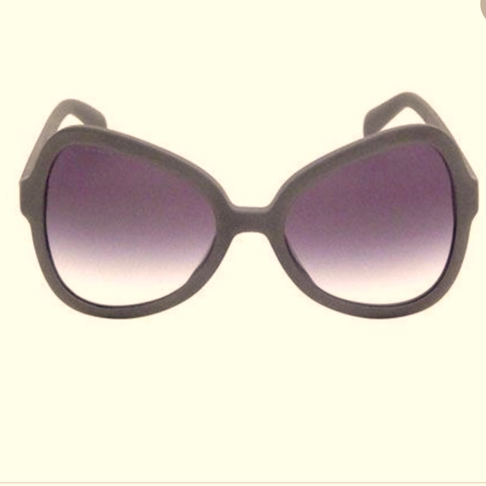 Prada SPR05s butterfly shape of the frame made by matt grey